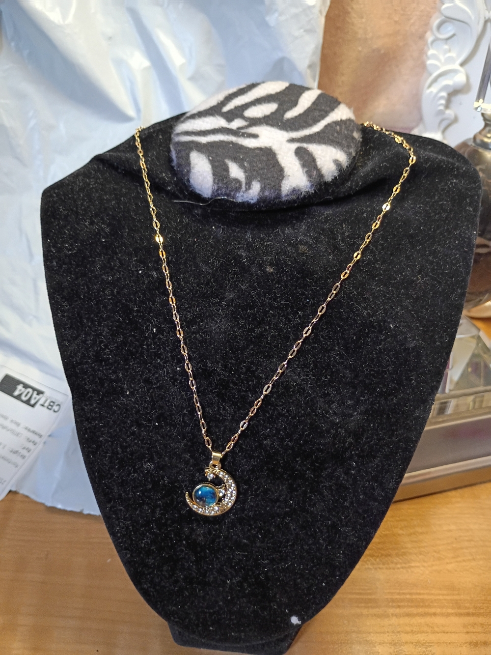 Gold-Tone Crescent Pendant Necklace with Blue Accent
